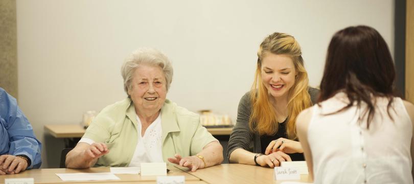 Group sitting down at the table