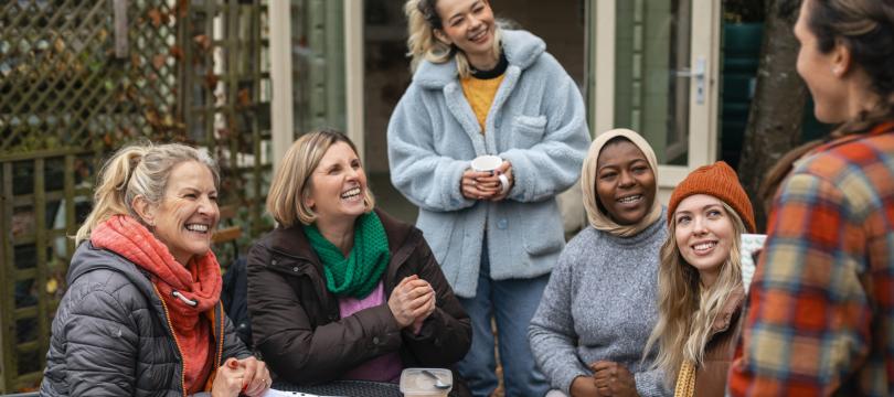 A group of women laughing together 