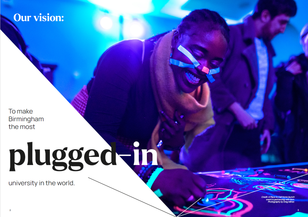 Poster from Birmingham's public engagement stragegy: photo of a person taking part in an activity with lights, with text saying: Our vision: to make Birmingham the most plugged-in university in the world.